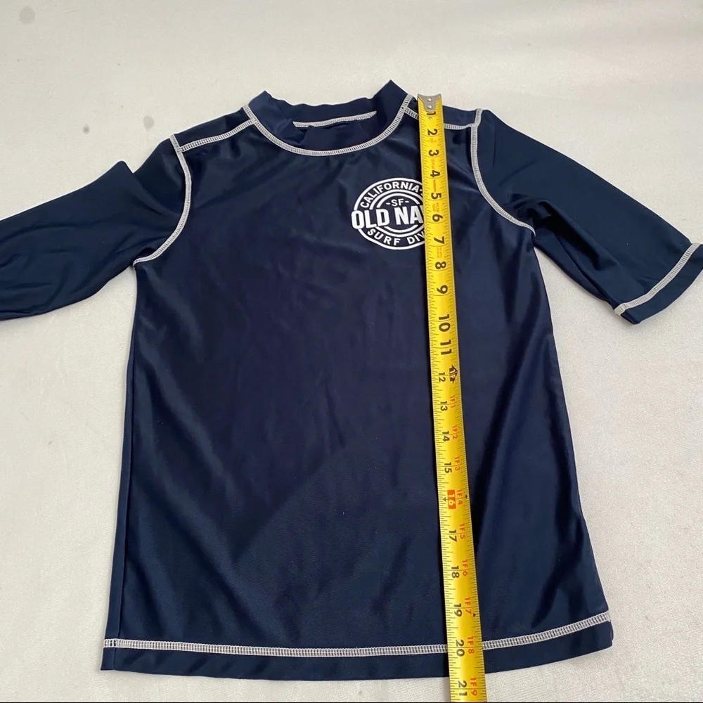Old Navy blue and white short sleeve rash guard M